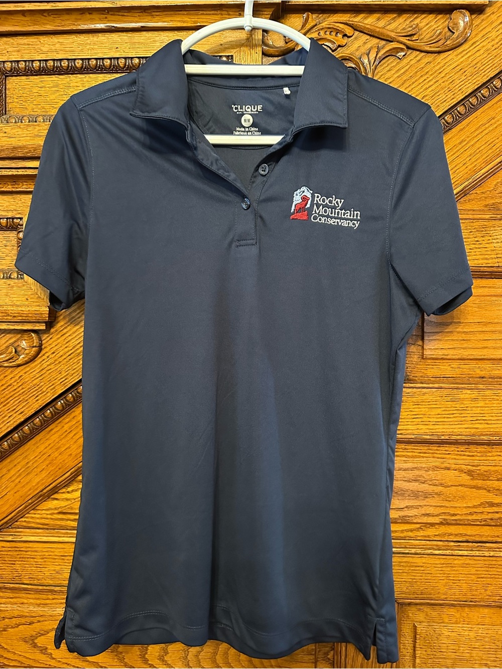 Clique Rocky Mountain Conservancy Embroidered Performance Polo Shirt Women’s Med